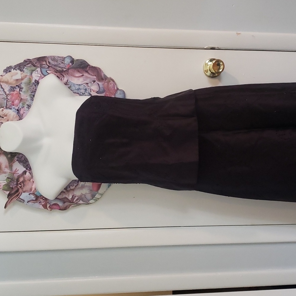 Bustier and long plum skirt.